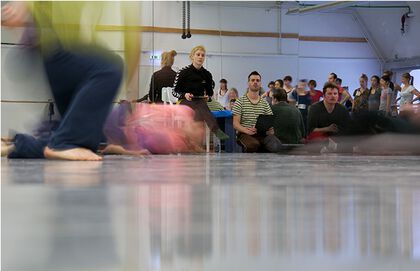 A photo, showing the three choreographers